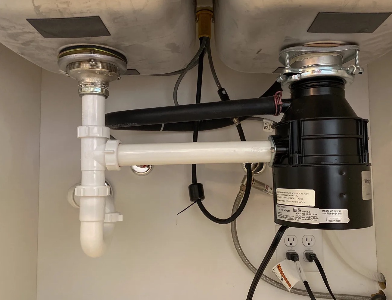 Leaky Garbage Disposal Cleanup in Milwaukee, WI